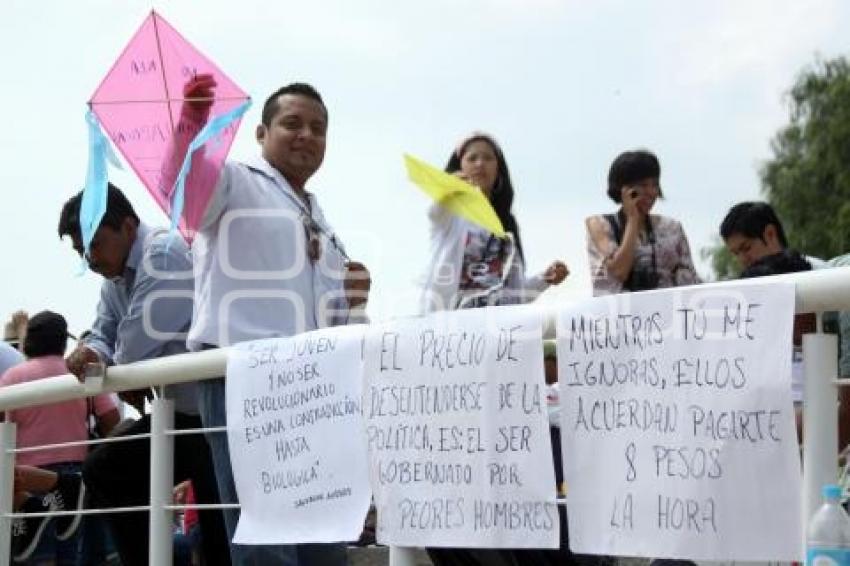 PROTESTAN EN CONTRA DE LA REFORMA LABORAL DURANTE EL HUEY ATLIXCÁYOTL