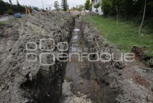 CONSTRUYEN CANAL DE DESFOGUE EN CRUCERO DE MARGARITAS Y NACIONAL