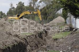 CONSTRUYEN CANAL DE DESFOGUE EN CRUCERO DE MARGARITAS Y NACIONAL