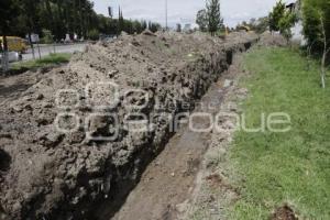 CONSTRUYEN CANAL DE DESFOGUE EN CRUCERO DE MARGARITAS Y NACIONAL