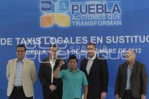 GOBIERNO . ENTREGA TAXIS LOCALES