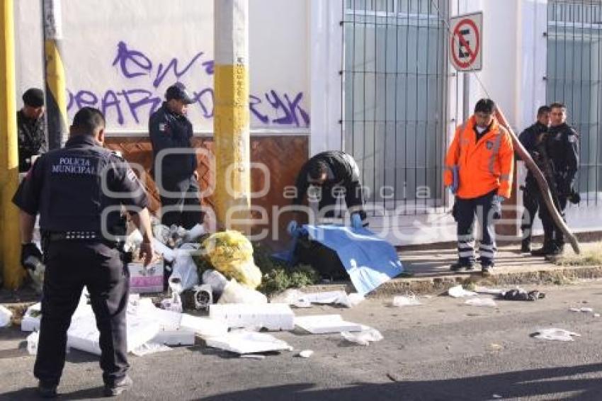 HALLAN MUJER MUERTA EN MALETA