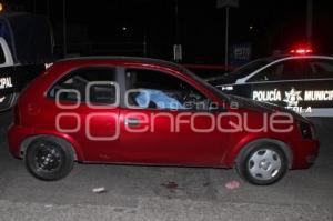 MUERTO AL INTERIOR DE AUTO