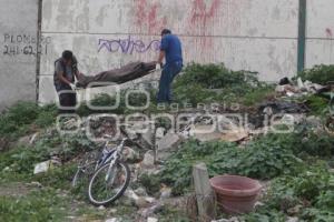 MUJER ASESINADA