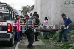 MUJER ASESINADA