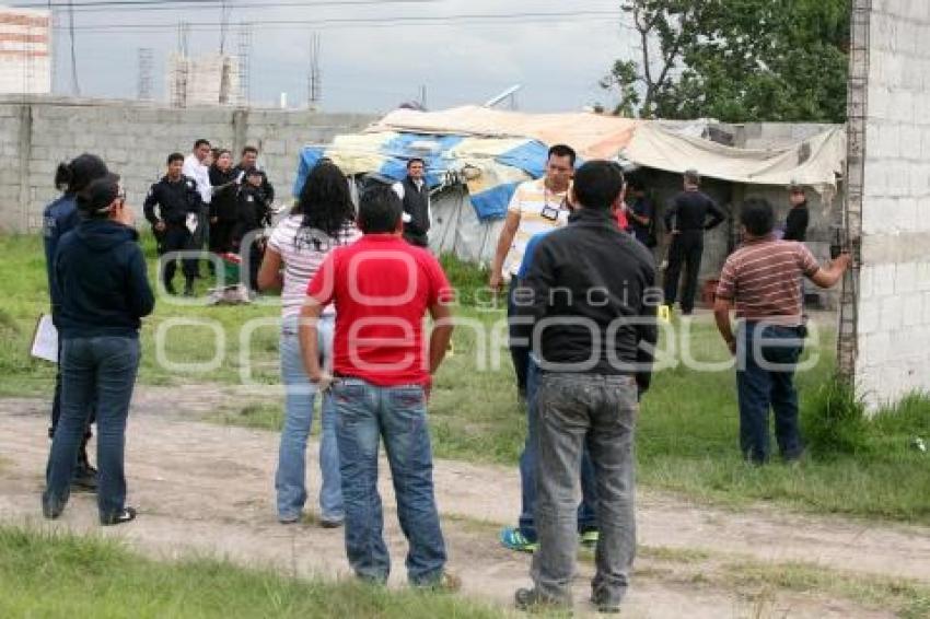 ENCUENTRAN A POLICÍA MUERTO