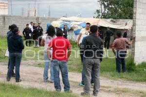 ENCUENTRAN A POLICÍA MUERTO