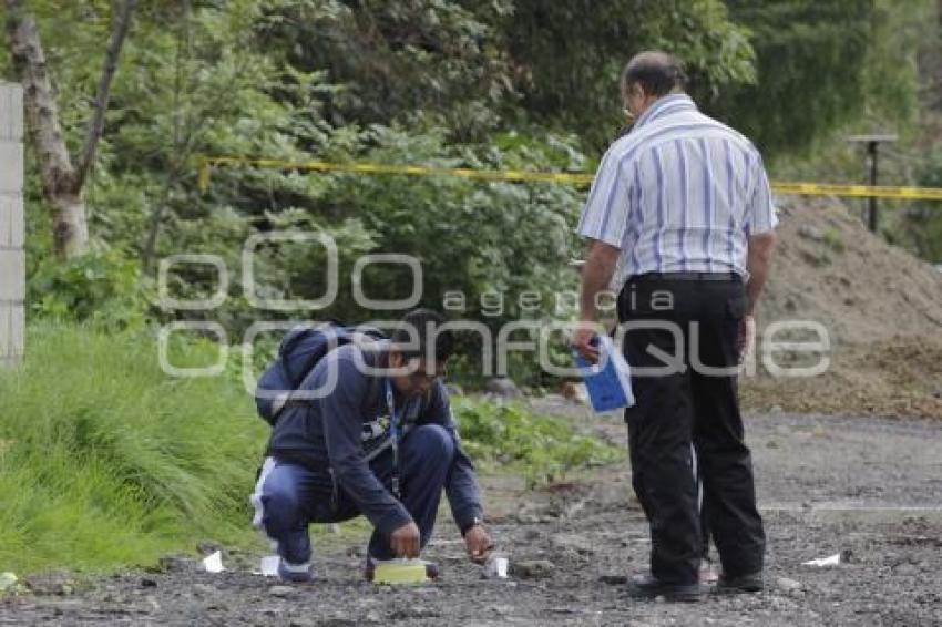 HALLAN EJECUTADO JUNTO AL ATOYAC