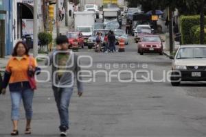 COLOCAN SELLO EN PAVIMENTO DE LA 26 NORTE