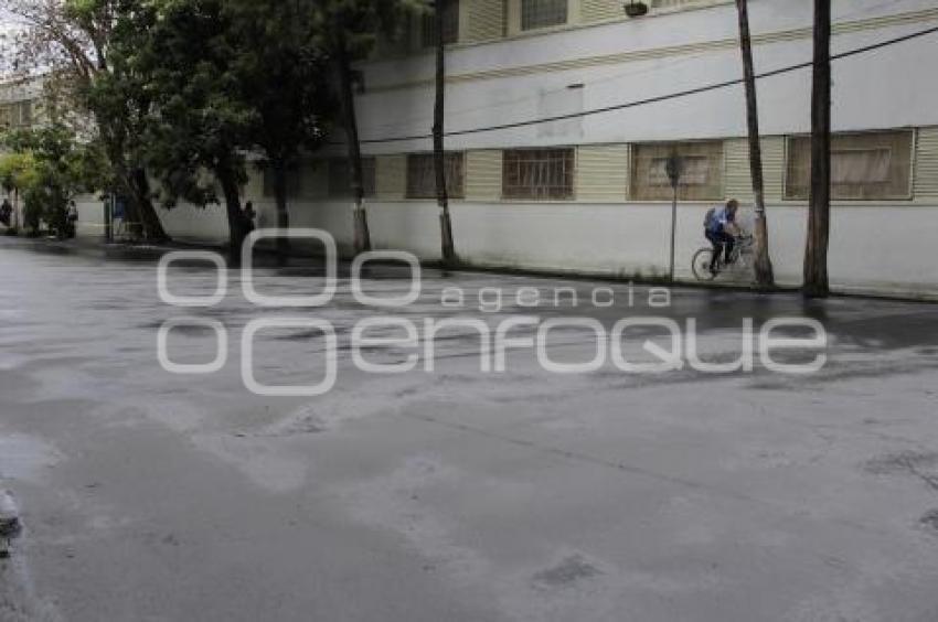 COLOCAN SELLO EN PAVIMENTO DE LA 26 NORTE
