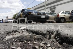 BACHES Y DETERIORO ASFÁLTICO