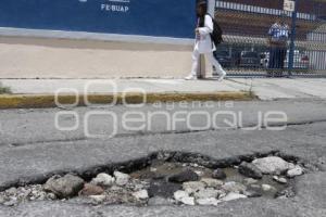 BACHES Y DETERIORO ASFÁLTICO