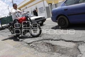 BACHES Y DETERIORO ASFÁLTICO