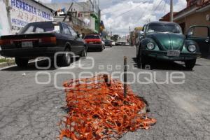 BACHES Y DETERIORO ASFÁLTICO