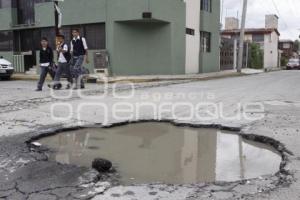 BACHES Y DETERIORO ASFÁLTICO