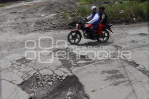 BACHES Y DETERIORO ASFÁLTICO