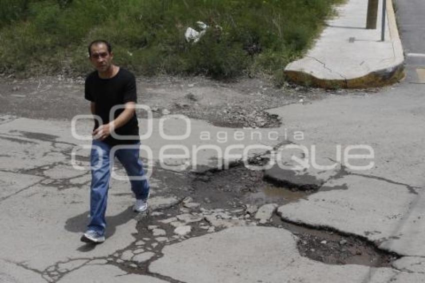 BACHES Y DETERIORO ASFÁLTICO