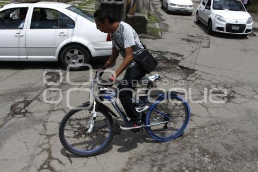 BACHES Y DETERIORO ASFÁLTICO