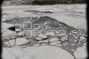 BACHES Y DETERIORO ASFÁLTICO