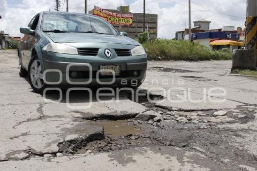 BACHES Y DETERIORO ASFÁLTICO