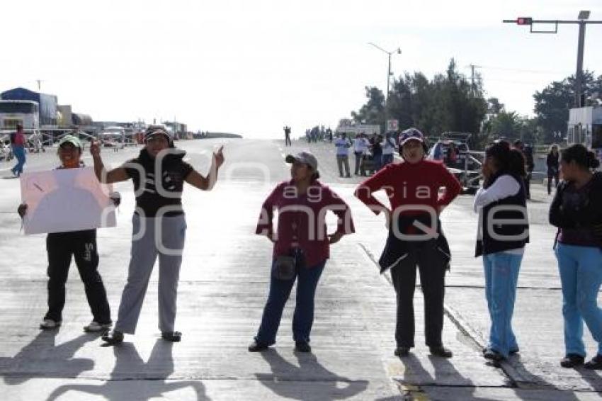 CIERRAN CASETA DE AMOZOC POBLADORES DE SAN MIGUEL ESPEJO