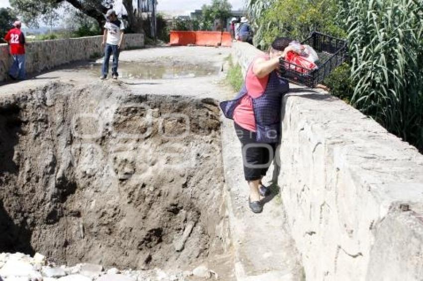 DERUMBE PUENTE EN CONCEPCIÓN CAPULAC