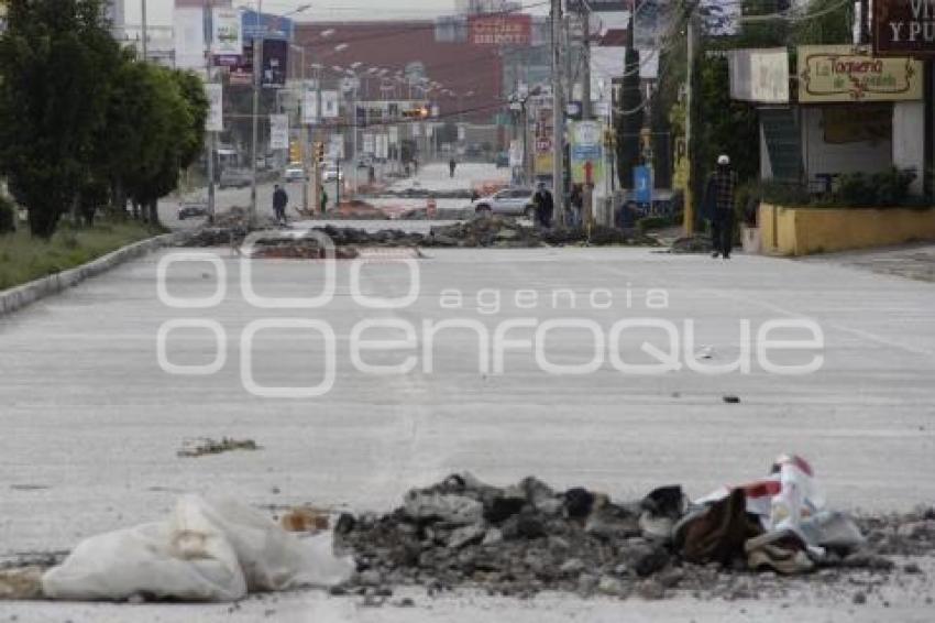 CIEN POR CIENTO PAVIMENTACIÓN CALZADA ZAVALETA