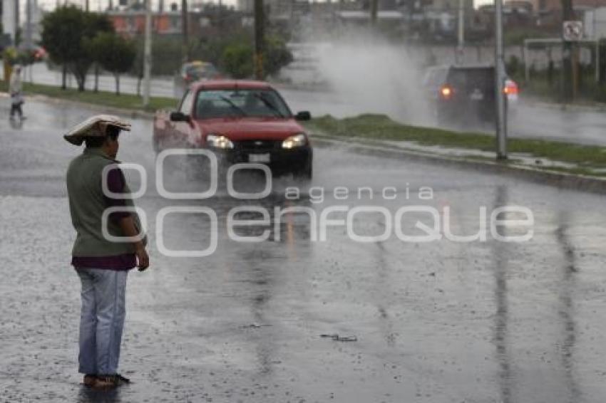 LLUVIAS. RAYMOND