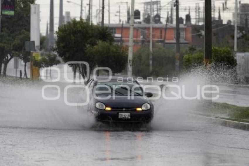 LLUVIAS. RAYMOND