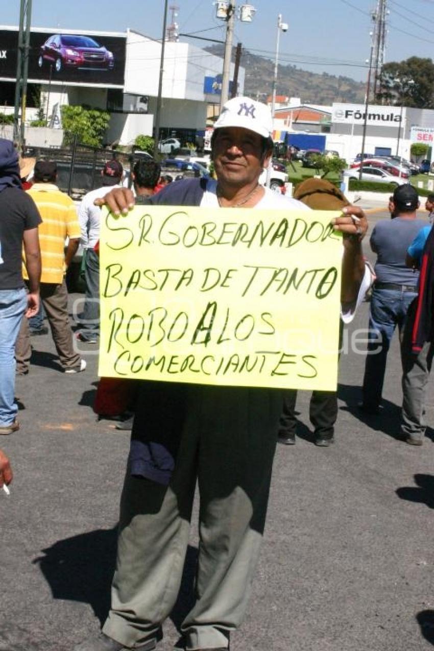 TIANGUISTAS DE TEXMELUCAN EXIGEN SEGURIDAD