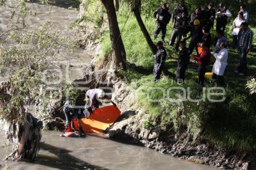 RÍO ATOYAC . CUERPO FLOTANDO