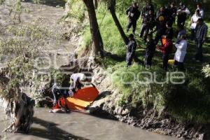 RÍO ATOYAC . CUERPO FLOTANDO