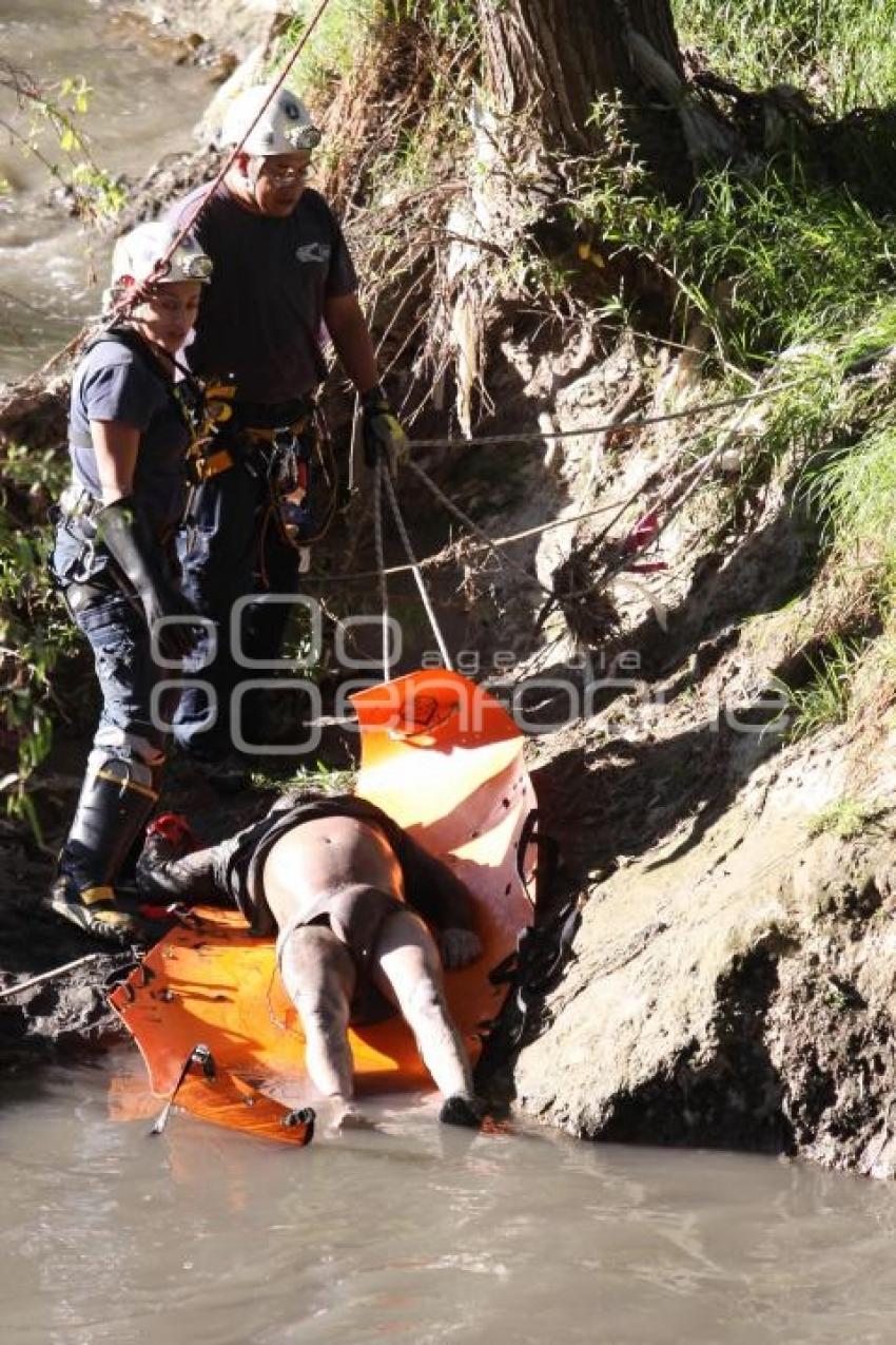 RÍO ATOYAC . CUERPO FLOTANDO