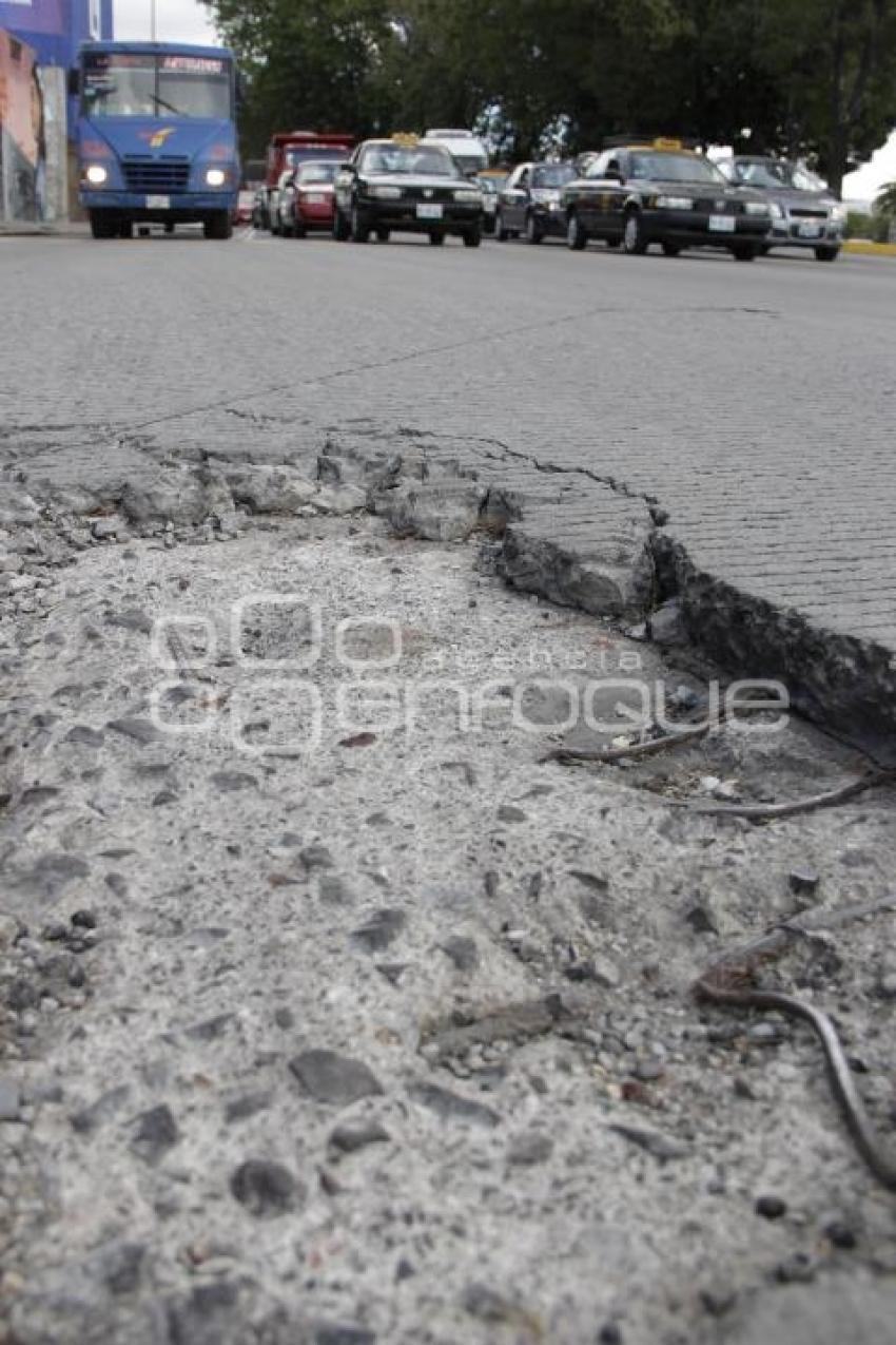 BACHE EN CALLE DE CONCRETO HIDRÁULICO