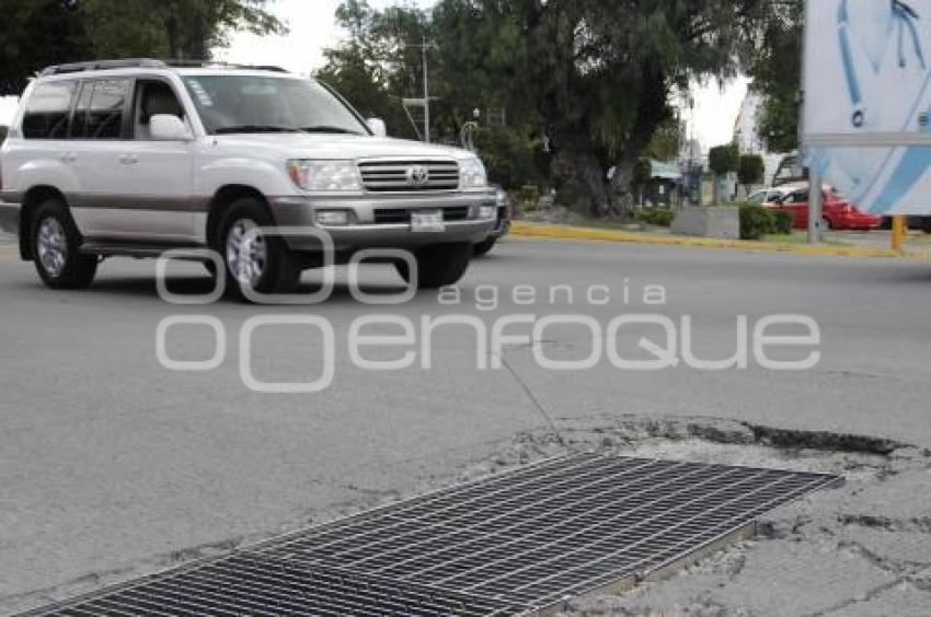 BACHE EN CALLE DE CONCRETO HIDRÁULICO