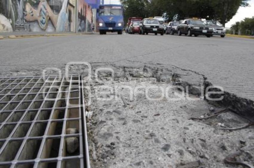 BACHE EN CALLE DE CONCRETO HIDRÁULICO