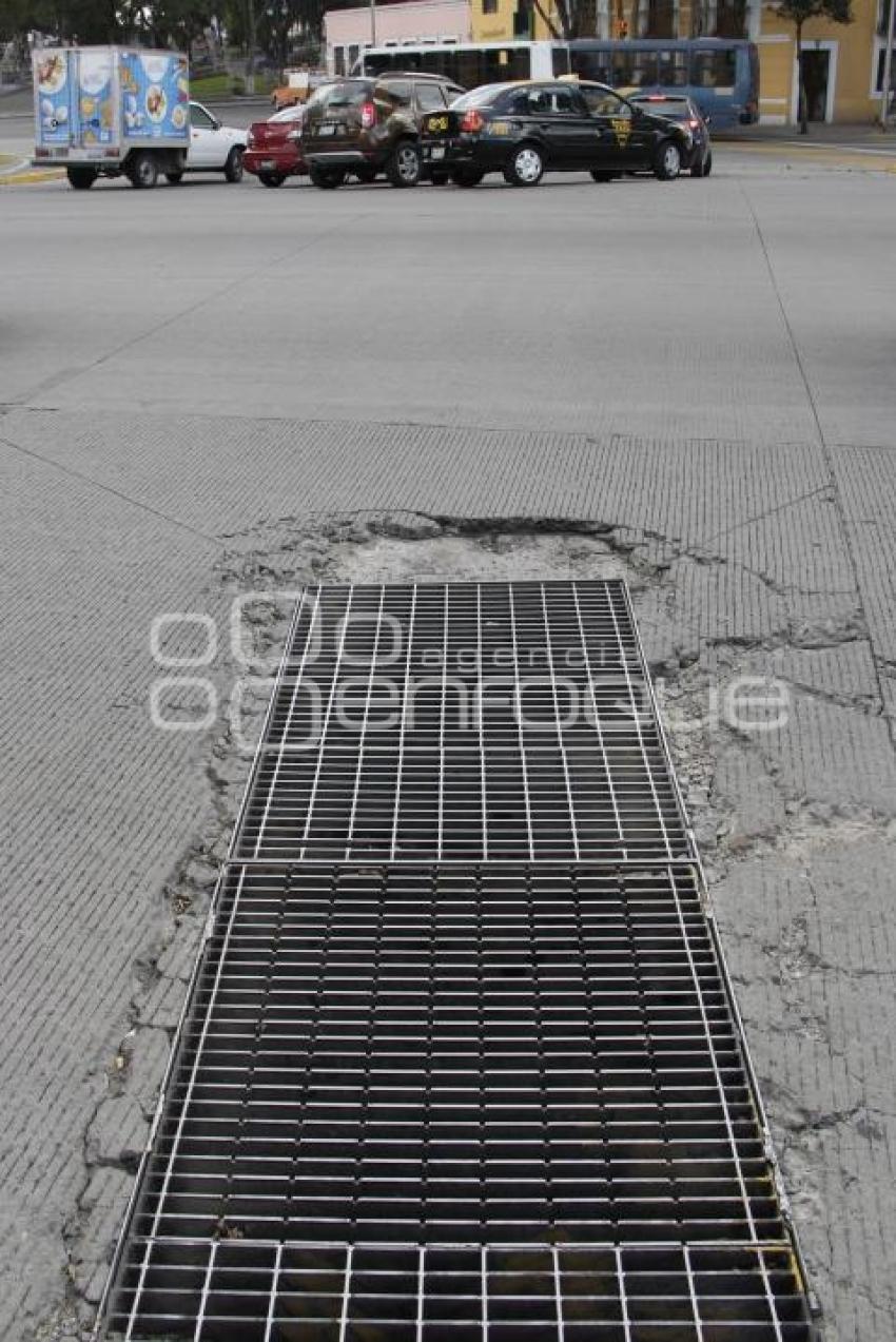 BACHE EN CALLE DE CONCRETO HIDRÁULICO