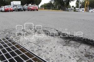 BACHE EN CALLE DE CONCRETO HIDRÁULICO