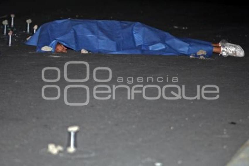 ASESINATO CON ARMA DE FUEGO