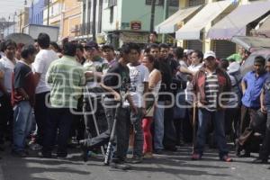 DESCONTENTO ENTRE LOCATARIOS . MERCADO 5 DE MAYO