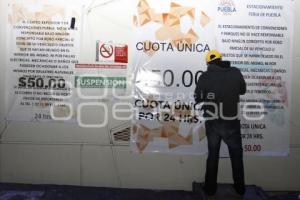 SUSPENSIÓN ESTACIONAMIENTO CENTRO EXPOSITOR