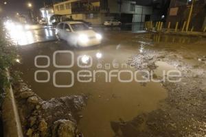 GRANIZA EN EL CENTRO DE LA CIUDAD . LLUVIA