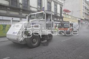 SERVICIO DE LIMPIA AL TÉRMINO DE LA PROCESIÓN . VIERNES SANTO