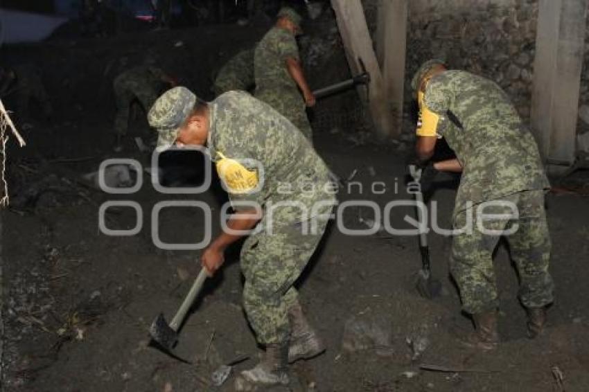 TROMBA EN HUEHUETLAN DOS MUERTOS Y DOS DESAPERECIDOS