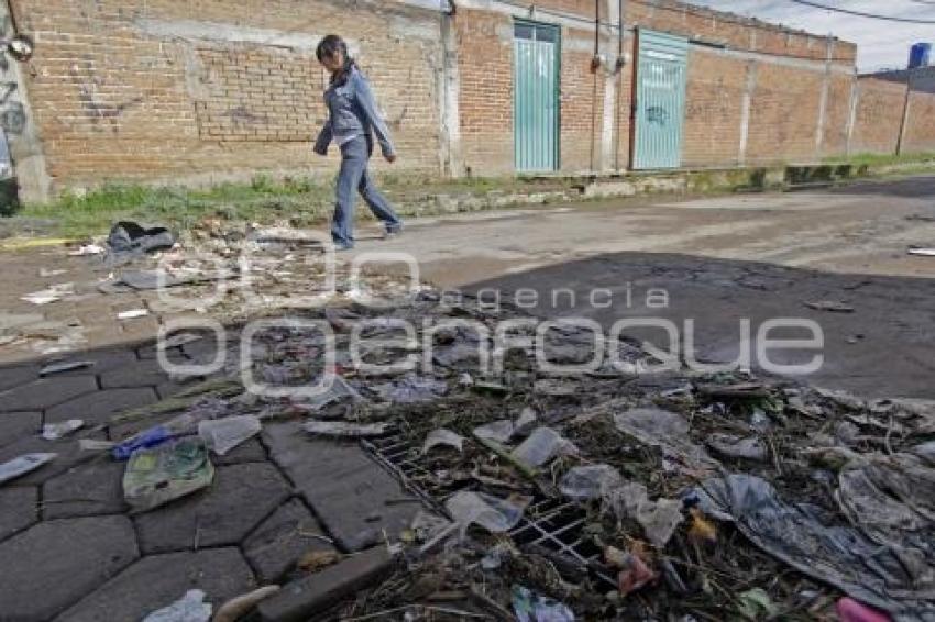 LLUVIAS . BASURA