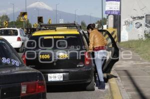 TRANSPORTE . TAXI