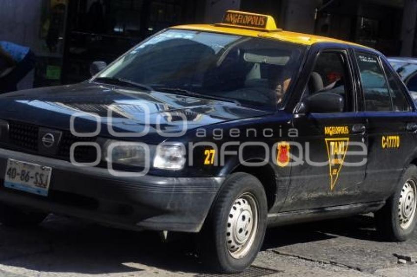 TRANSPORTE . TAXI
