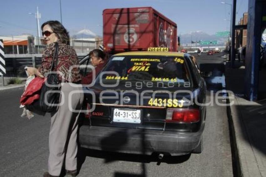 TRANSPORTE . TAXI