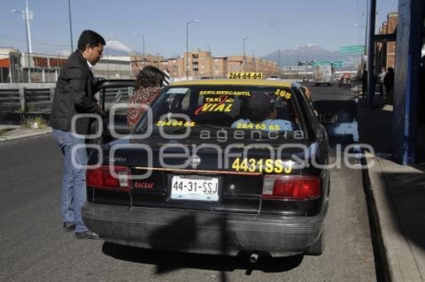 TRANSPORTE . TAXI