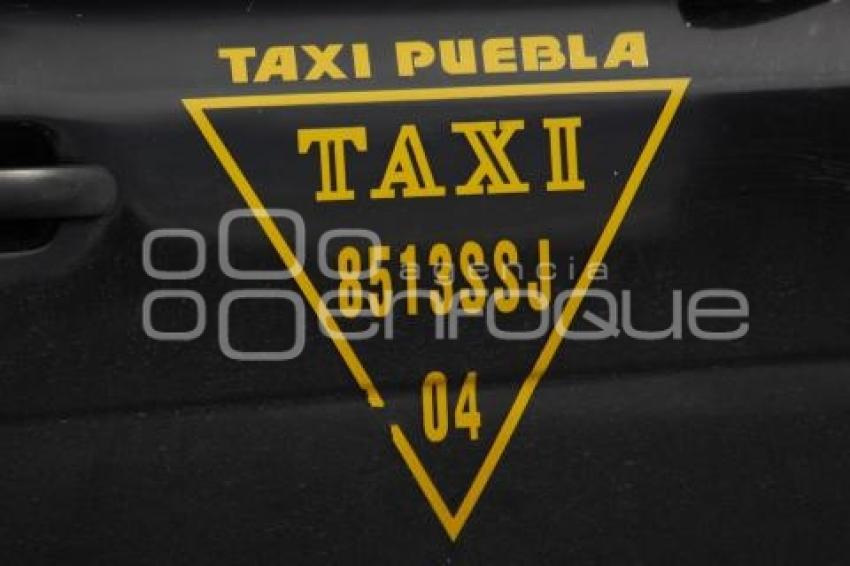 TRANSPORTE . TAXI